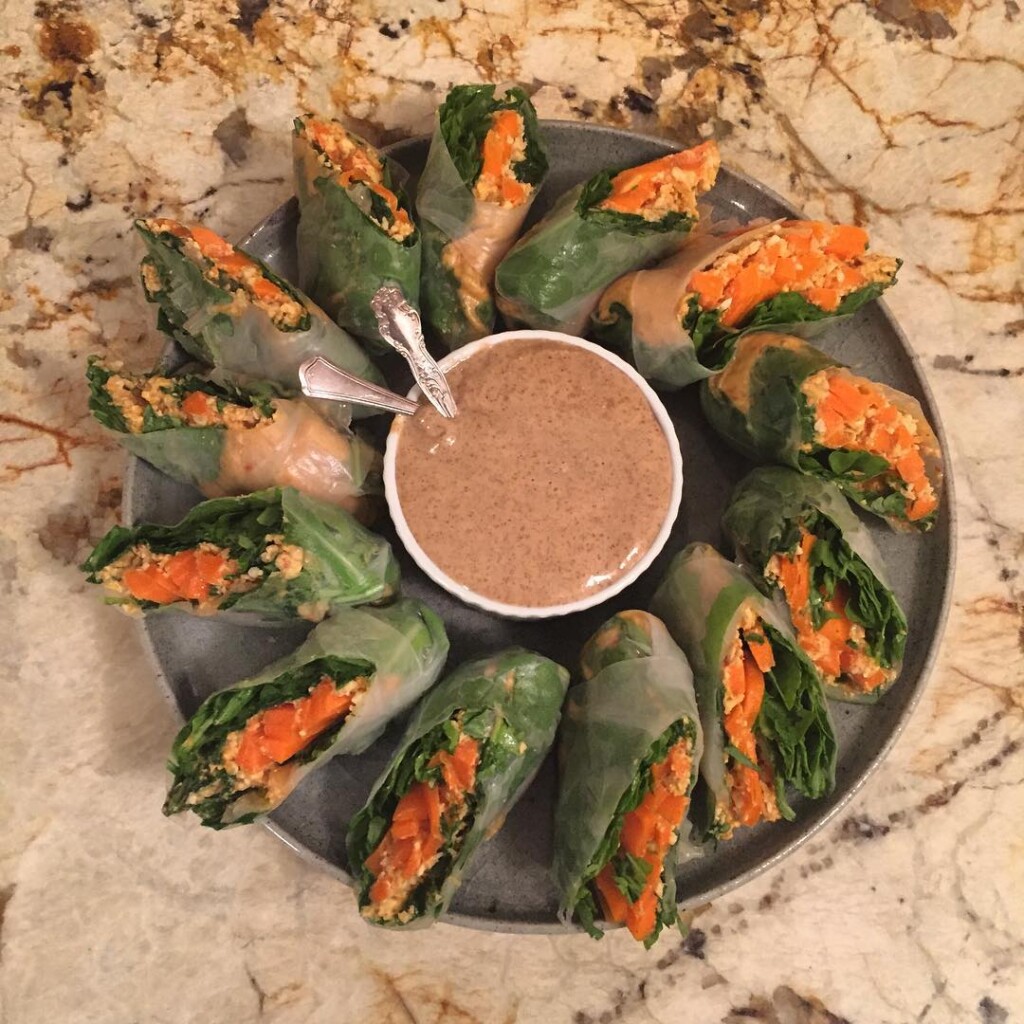 A platter of fresh spring rolls around a bowl of dipping sauce, made by Chef Jess Rice